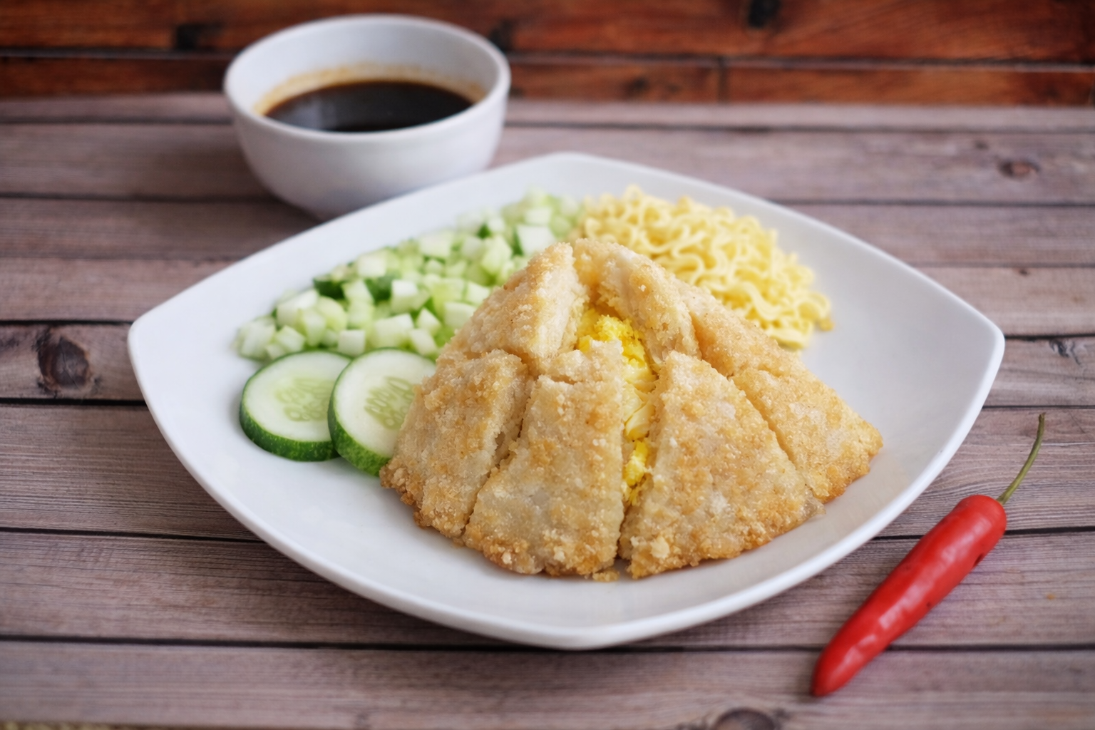 Pempek Kapal Selam — telur utuh dibungkus adonan tenggiri tebal